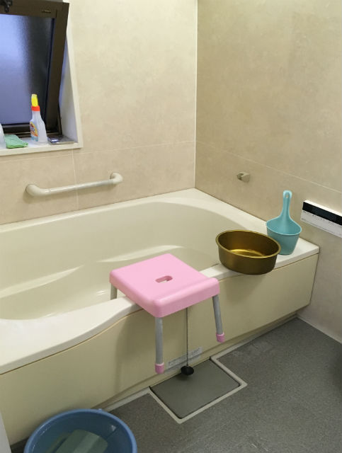 アクセントパネルのブリックナチュラルで上品な浴室空間に施工後イメージ１